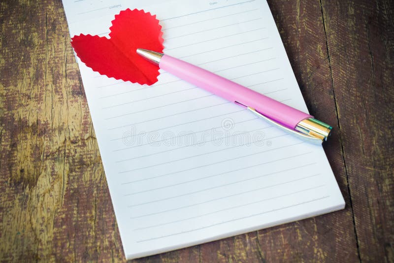 Notebook with heart. Send message to your lover in Valentine's day