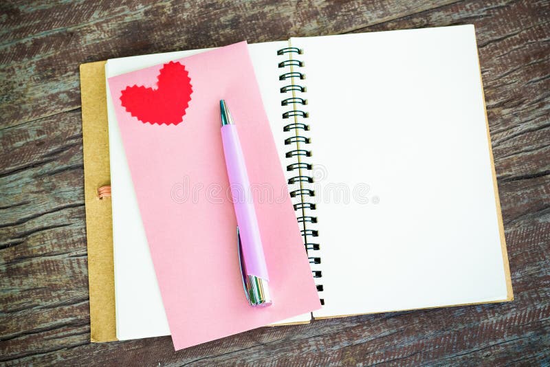 Notebook with heart. Send message to your lover in Valentine's day