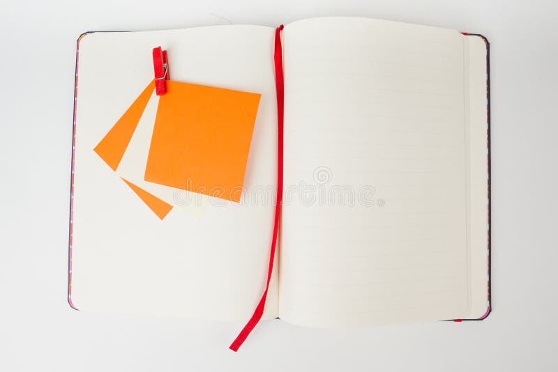 Notebook with orange stickers. stock images
