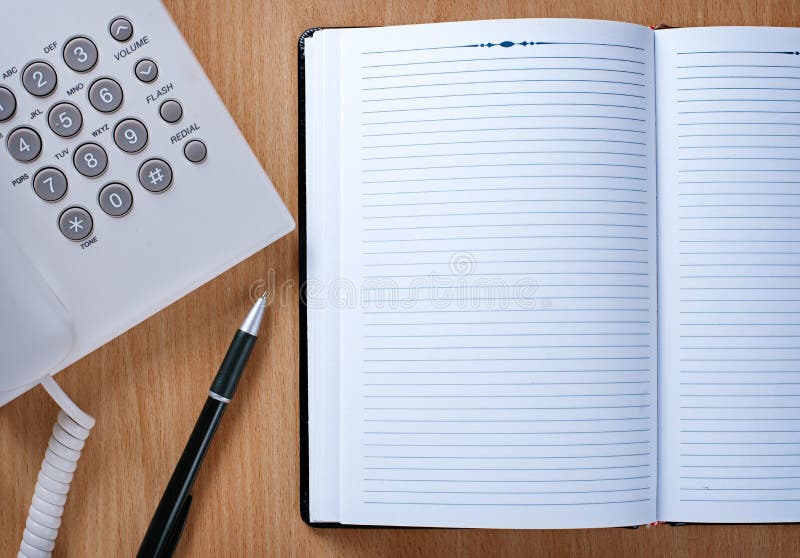 Notebook and Pen on Telephone Operator Table