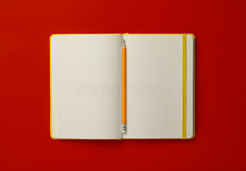 Notebook and pencil on red background, top view stock image