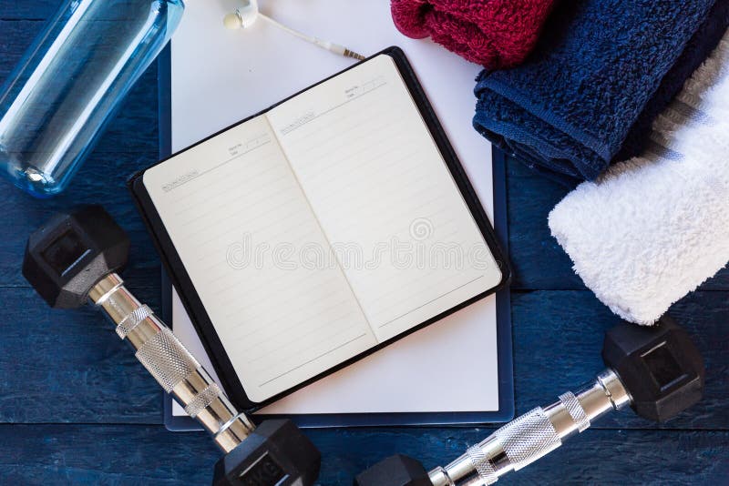 Notebook between Sport Equipment.Blank of Paper Stock Photo Image of