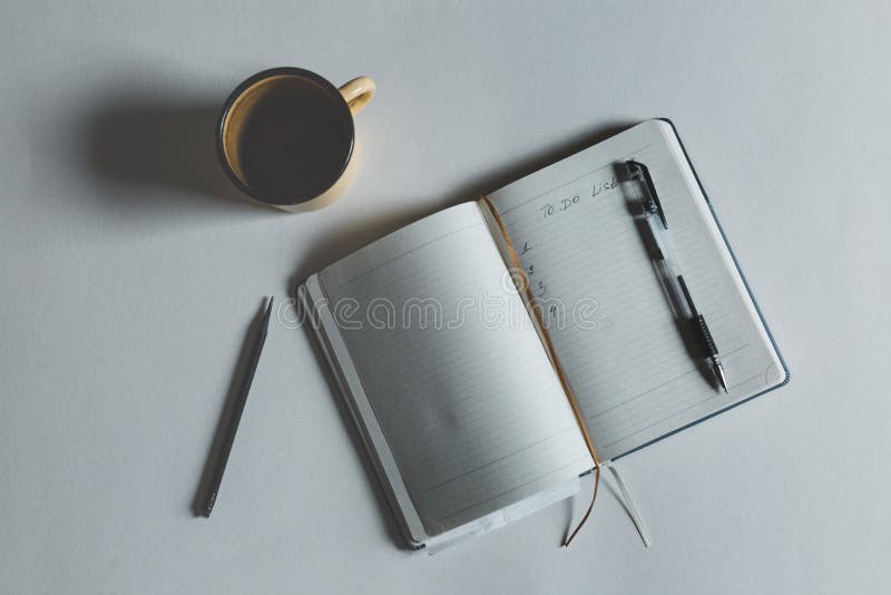 Image Of Open Notebook With Text To Do List Next To Cup Of Coffee on top view royalty free stock image Image Of Open Notebook With Text To Do List Next To Cup Of Coffee on top view royalty free stock image