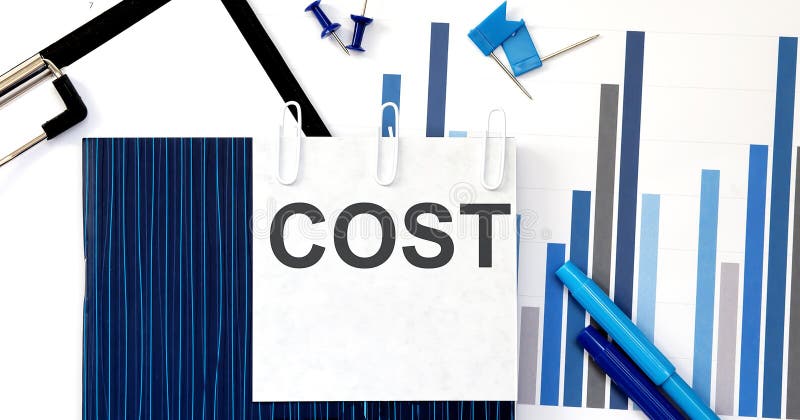 Notebook with Toolls and Notes about COST on sticker ,concept royalty free stock image