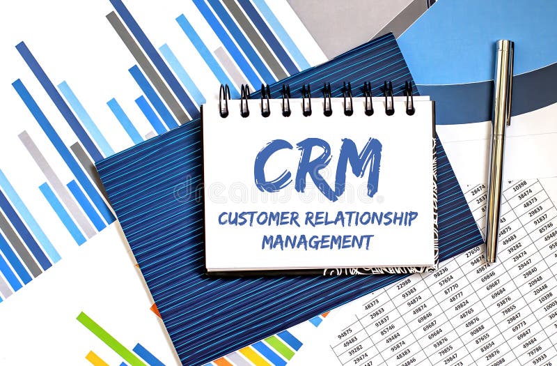 Notebook with Toolls and Notes about CRM with chart ,concept stock photography