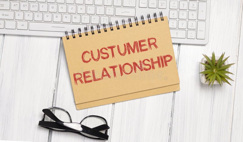 Notebook with Toolls and Notes about Customer Relationship stock photos