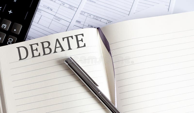 Notebook with Toolls and Notes about DEBATE stock photo