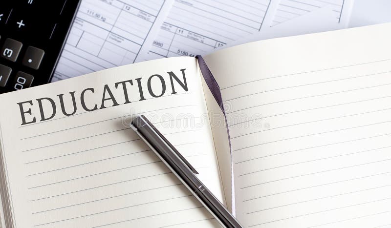 Notebook with Toolls and Notes about EDUCATION royalty free stock photos
