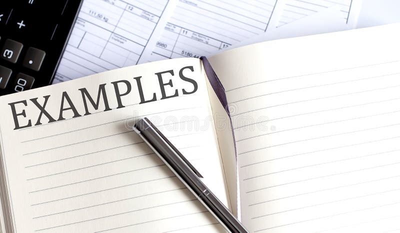 Notebook with Toolls and Notes about EXAMPLES royalty free stock image