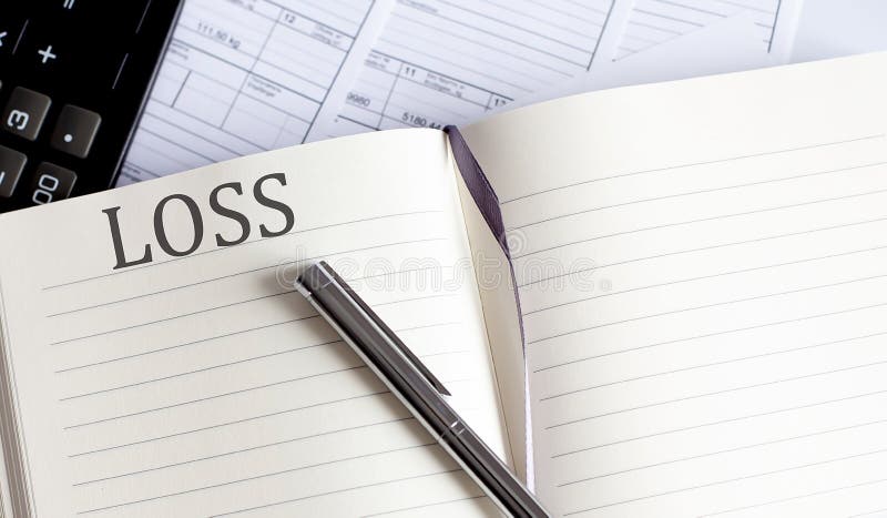 Notebook with Toolls and Notes about LOSS royalty free stock images