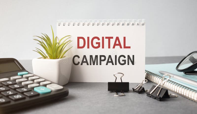 Notebook with Toolls and Notes. DIGITAL CAMPAIGN text stock image