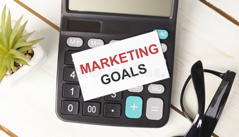 Notebook with Toolls and Notes about Marketing Goals royalty free stock images