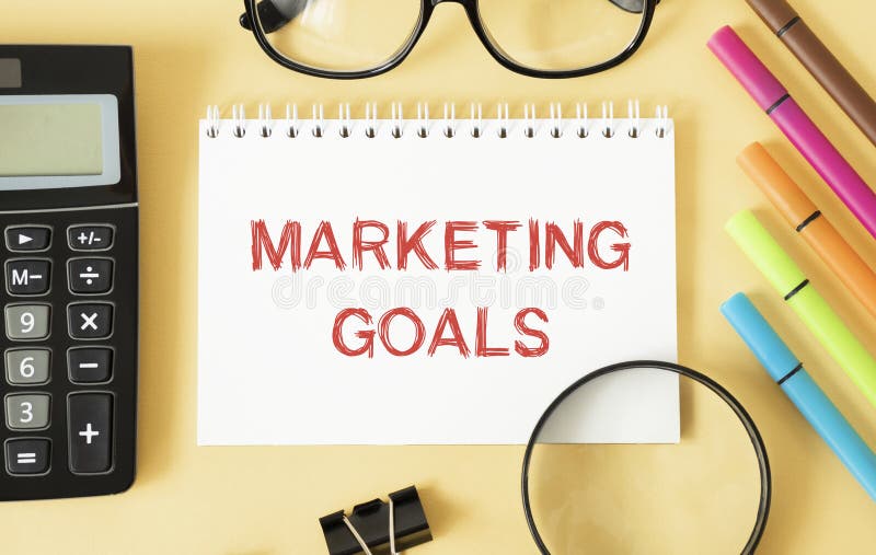 Notebook with Toolls and Notes about Marketing stock photos