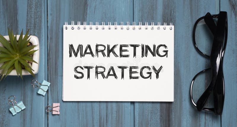 Notebook with Toolls and Notes about Marketing Strategy royalty free stock photo
