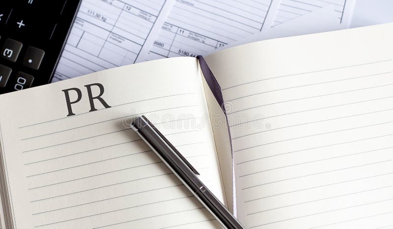 Notebook with Toolls and Notes about PR stock image