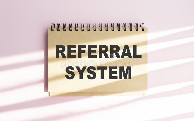 Notebook with Toolls and Notes about Referral System stock photos