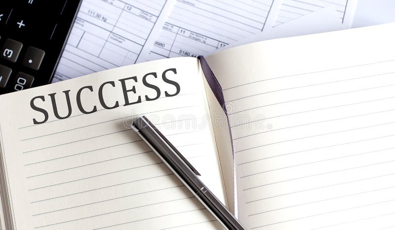 Notebook with Toolls and Notes about SUCCESS royalty free stock photography