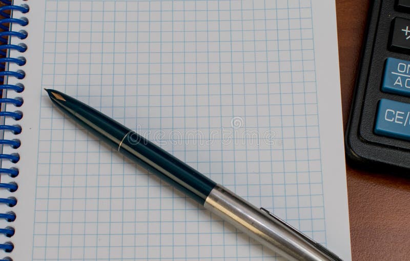Notepad Pen and Calculator on the Table Stock Image Image of notepad