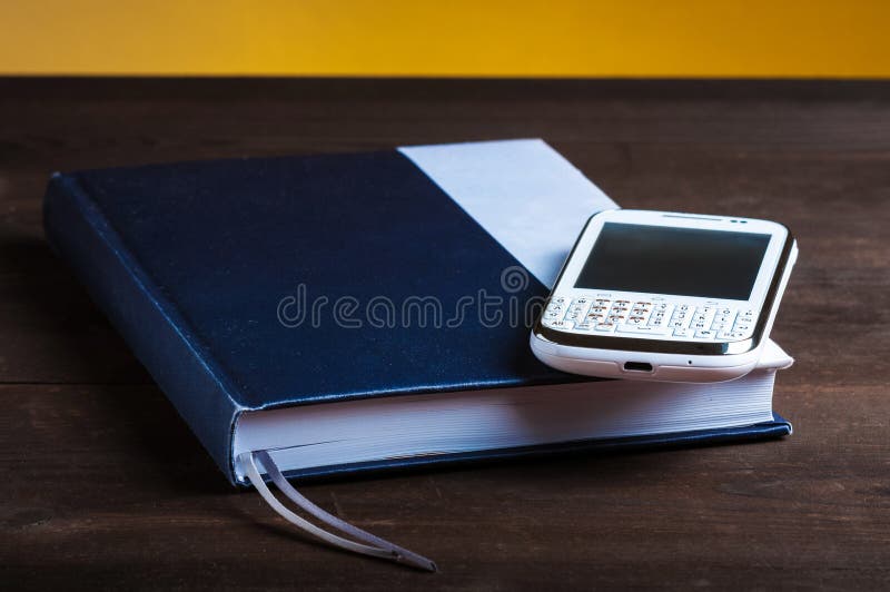 Notepad and phone stock image. Image of tablet, desk 48111209