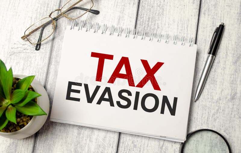 Notepad with Text Tax Evasion with Office Supplies Stock Image Image