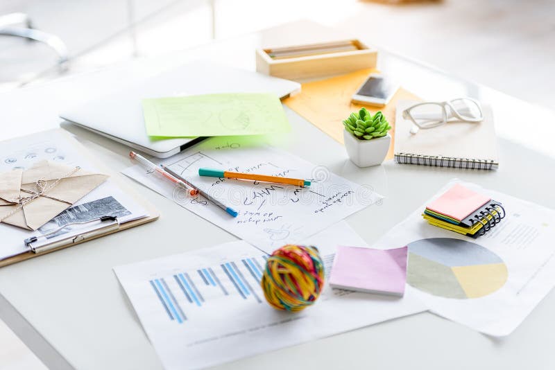 Notes of creative worker scattered on table royalty free stock images Notes of creative worker scattered on table royalty free stock images