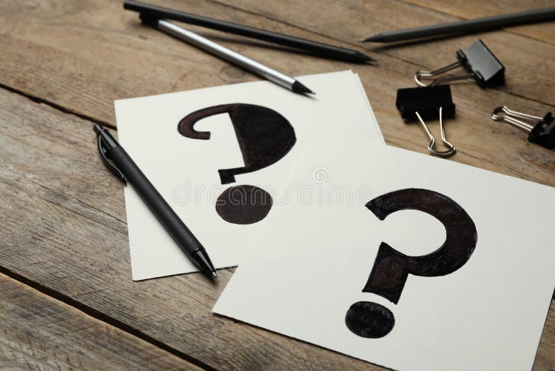 Notes with Question Marks and Pen on Wooden Table Stock Photo Image