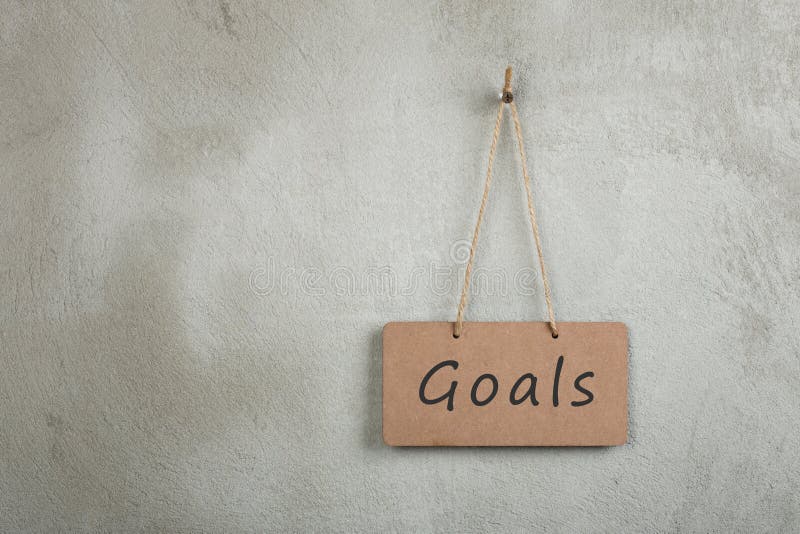 notice board, blackboard, chalkboard with text Goals and copy space grey cement wall stock photos notice board, blackboard, chalkboard with text Goals and copy space grey cement wall stock photos