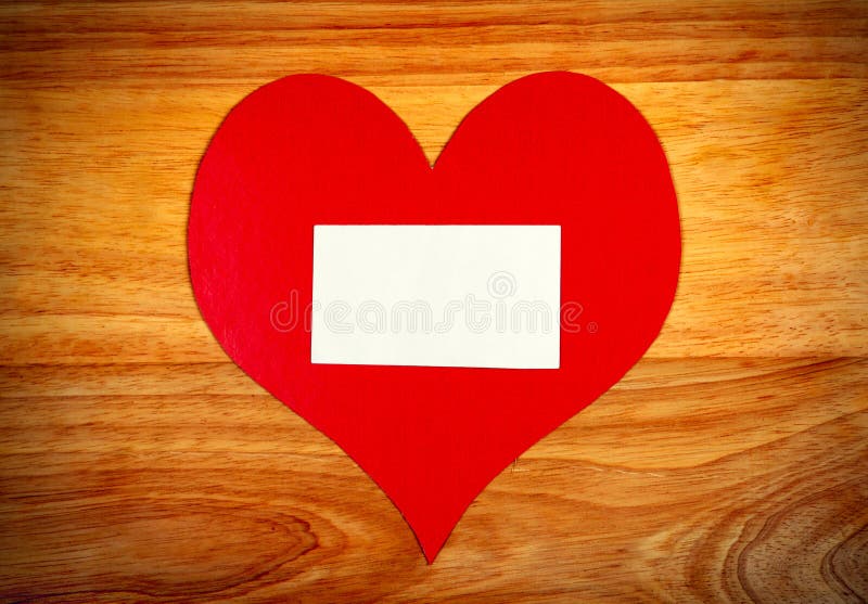 Notice Board with Heart Shapes on Wooden Background