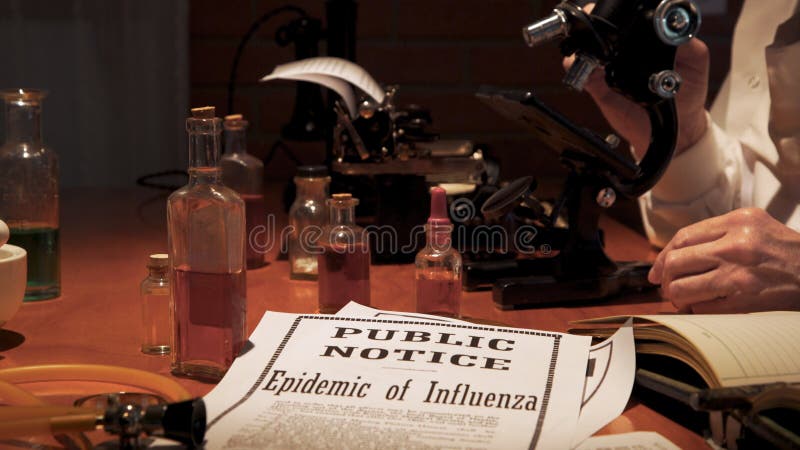 Notice of the influenza epidemic of the year 1918 lying on the laboratory table.