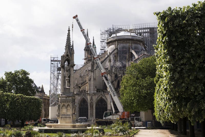 Notre-Dame de Paris medieval Catholic cathedral after the fire, rear view. Renovation work royalty free stock photo Notre-Dame de Paris medieval Catholic cathedral after the fire, rear view. Renovation work royalty free stock photo