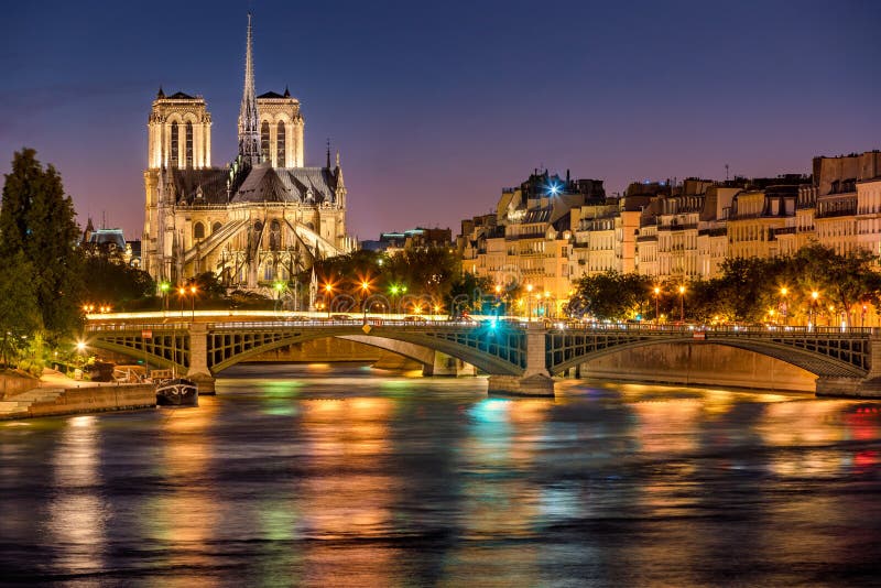 Notre Dame De Paris, Seine River and the Sully Bridge at Twilight ...