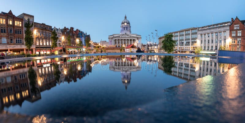 Council House also known as the city hall in the Old Market Square with a pool and fountain in the foreground, Nottingham, Nottinghamshire, England, UK,. Council House also known as the city hall in the Old Market Square with a pool and fountain in the foreground, Nottingham, Nottinghamshire, England, UK,