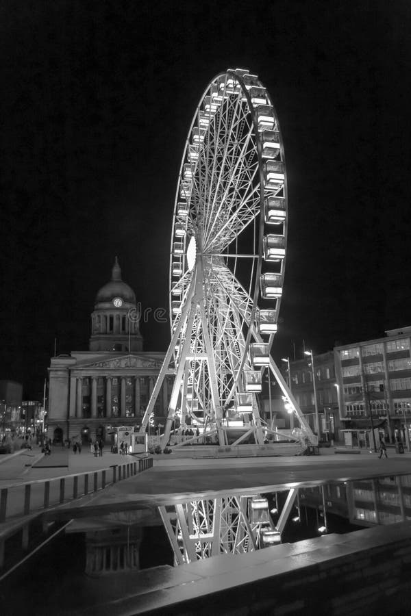 The Old Market Square in Nottingham England with a Ferris Wheel. The Old Market Square in Nottingham England with a Ferris Wheel