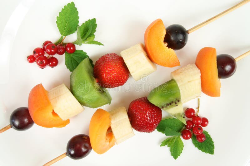 Fruits on a stick - delicious and healthy dessert. Fruits on a stick - delicious and healthy dessert