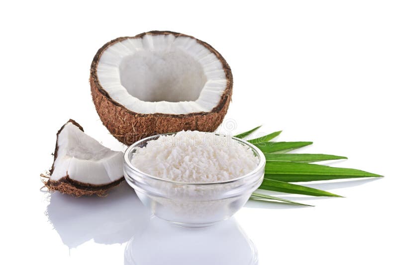 Nourriture saine Noix de coco fraîche avec des flocons dans la glace et les palmettes vertes photos libres de droits Nourriture saine Noix de coco fraîche avec des flocons dans la glace et les palmettes vertes photos libres de droits