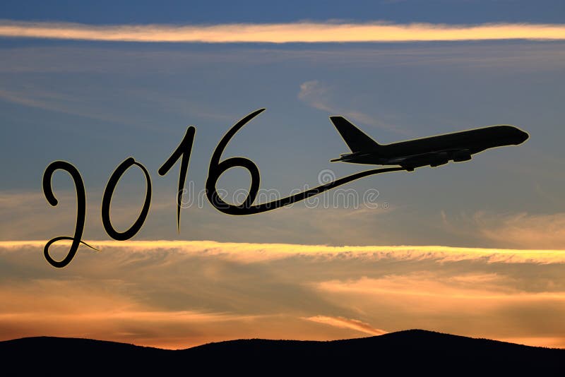 New year 2016 drawing by airplane on the air at sunset. New year 2016 drawing by airplane on the air at sunset