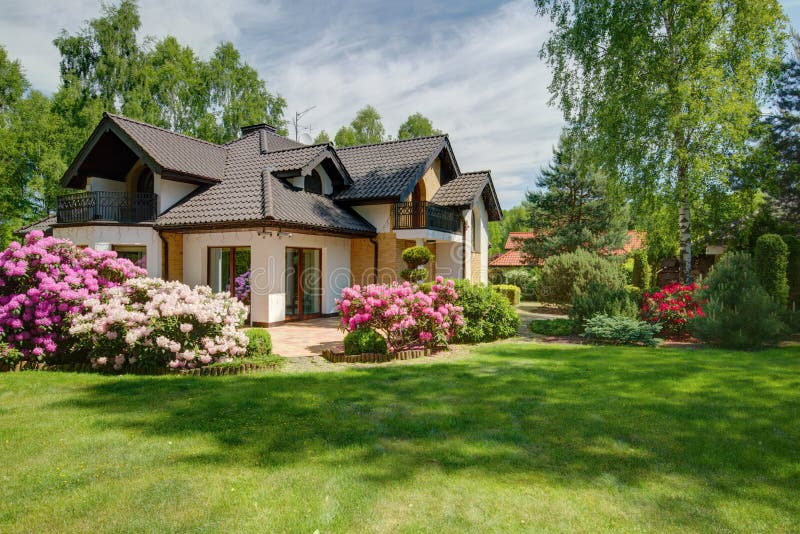 Photo of elegant new design villa with backyard. Photo of elegant new design villa with backyard