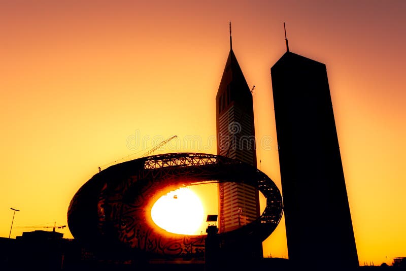 1 November 2019; Dubai, United Arab Emirates; The museum of future and Emirates Towers during the sunrise early in the morning