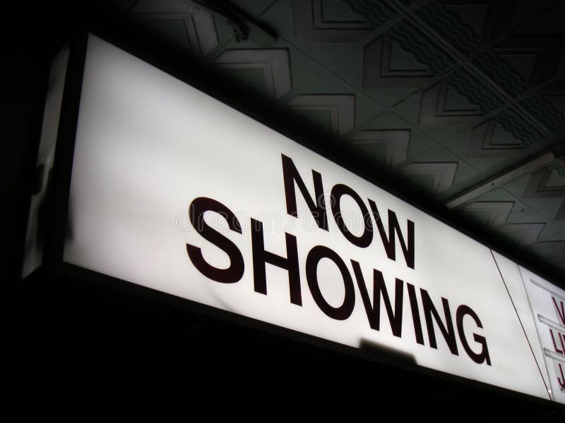 Now showing cinema sign 2 stock image. Image of illuminated 16867039