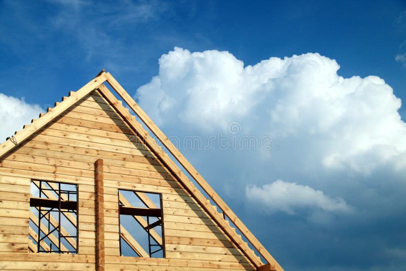 Windows in a new house against cloudy sky. Windows in a new house against cloudy sky.
