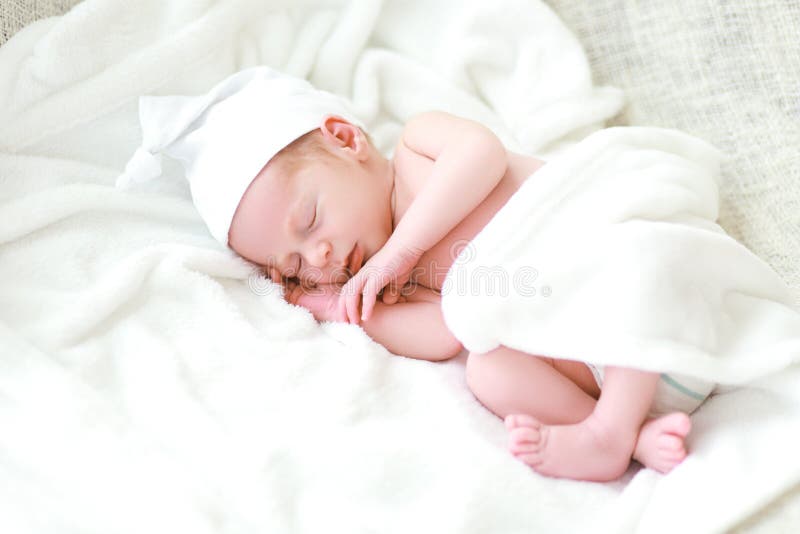 Beautiful new born little boy sleeping. Beautiful new born little boy sleeping