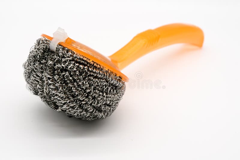 Nowy druciany stalowej wełny scourer z pomarańczową plastikową rękojeścią obrazy royalty free Nowy druciany stalowej wełny scourer z pomarańczową plastikową rękojeścią obrazy royalty free