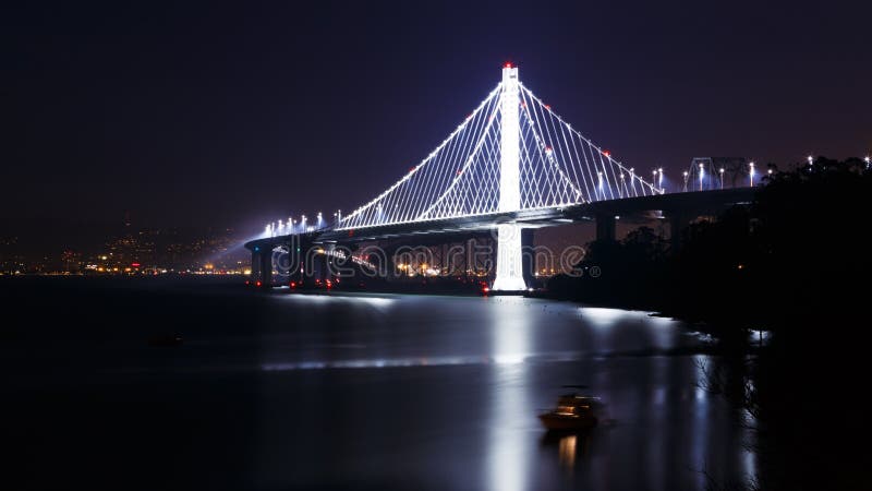 New span of the San Francisco-Oakland Bay Bridge illuminated at night. New span of the San Francisco-Oakland Bay Bridge illuminated at night