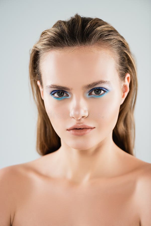 Wet Nude Young Woman Looking at Camera and Touching Face Isolated on White Stock Image - Image