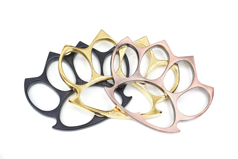 Plumero De Nudillo Del Metal Imagen de archivo - Imagen de puño, latón