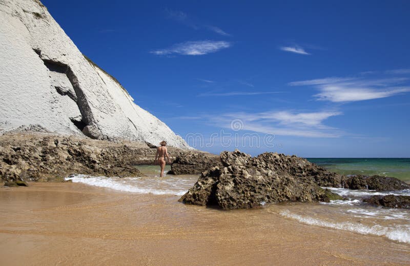 Male nudist on Playa de Covachos beach, Cantabria, Spain. Male nudist on Playa de Covachos beach, Cantabria, Spain