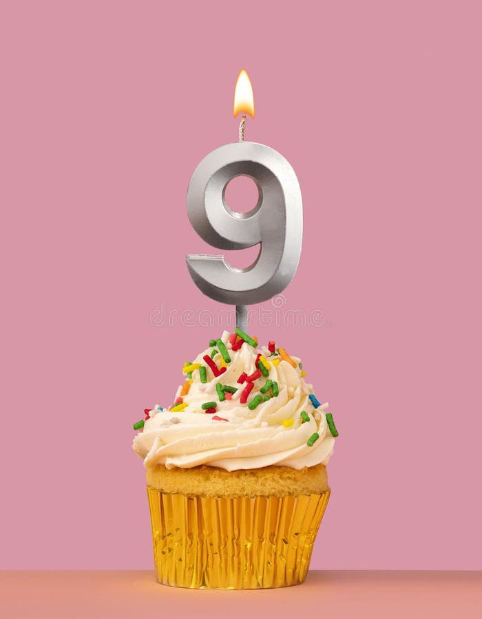 Number 9 candle with cupcake - Birthday card stock photo