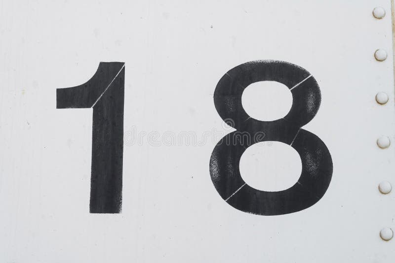 Number 18 eighteen white old metal background texture