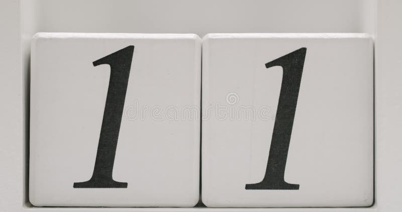 Number 11 On White Wooden Blocks For Dates Or Countdown Close-Up Image stock footage