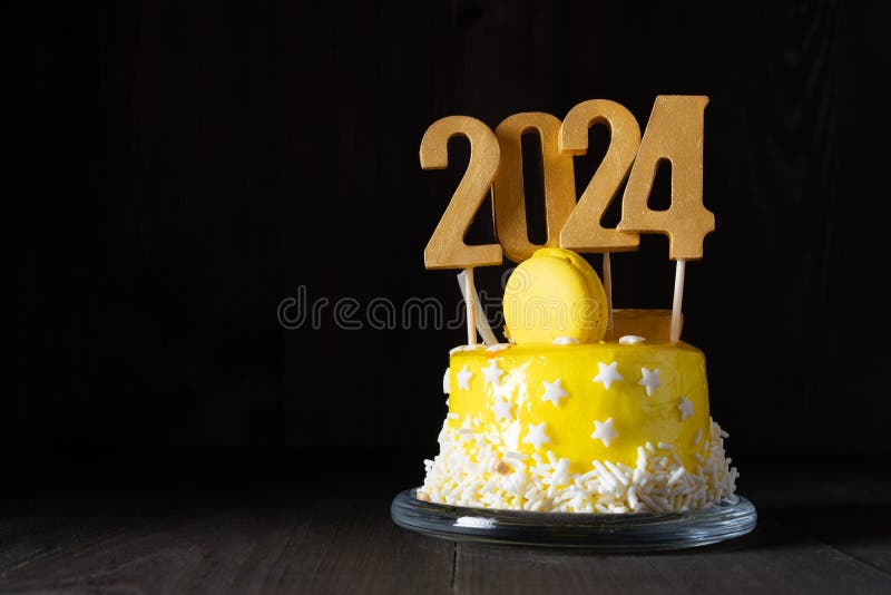 The Number 2024 on a Yellow Cake for an Anniversary or Birthday in a